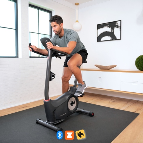 Descubre la bicicleta vertical Schwinn 510U con conectividad digital, 13 programas de entrenamiento y 16 niveles de resistencia. Compatible con las apps Explore the World&trade; y Zwift&reg;.